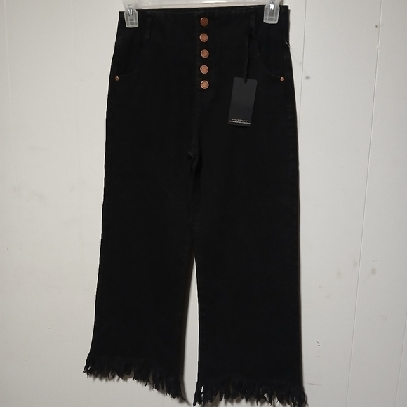 F- way Pants - F-way brand NWT ladies black capris.